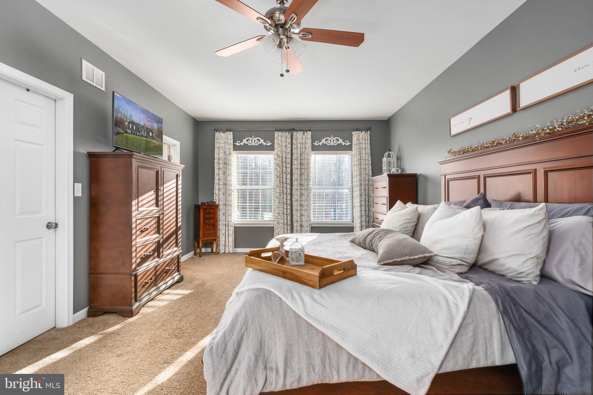 13026 Elk Run Road Bealeton, VA 22712 - Photo 31 of 55 Serene bedroom with natural light and charm.