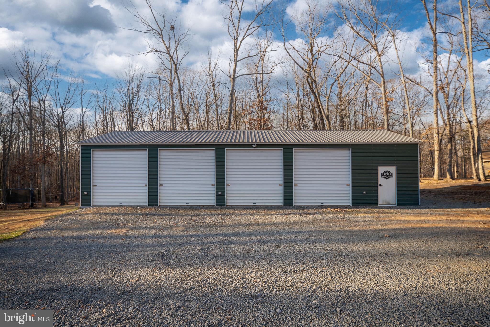 13026 Elk Run Road Bealeton, VA 22712 - Photo 38 of 55 Spacious garage nestled in serene woods.