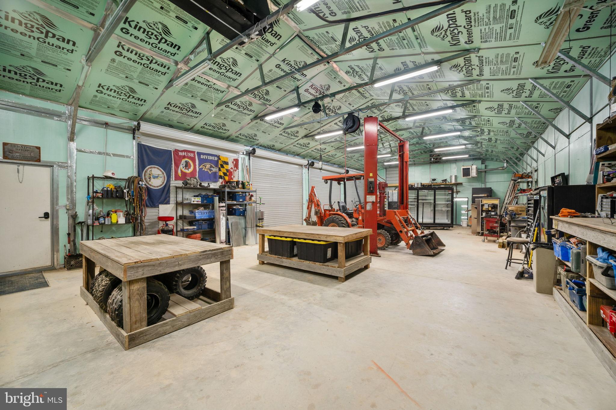 13026 Elk Run Road Bealeton, VA 22712 - Photo 39 of 55 Spacious workshop with industrial charm.