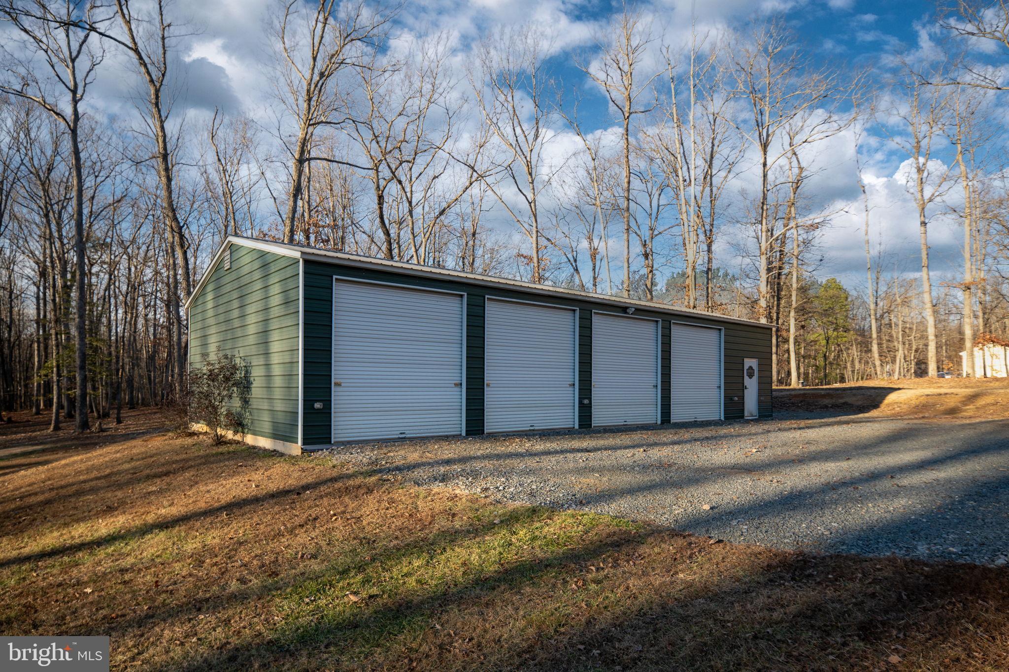 13026 Elk Run Road Bealeton, VA 22712 - Photo 42 of 54 Spacious storage building in serene woods.