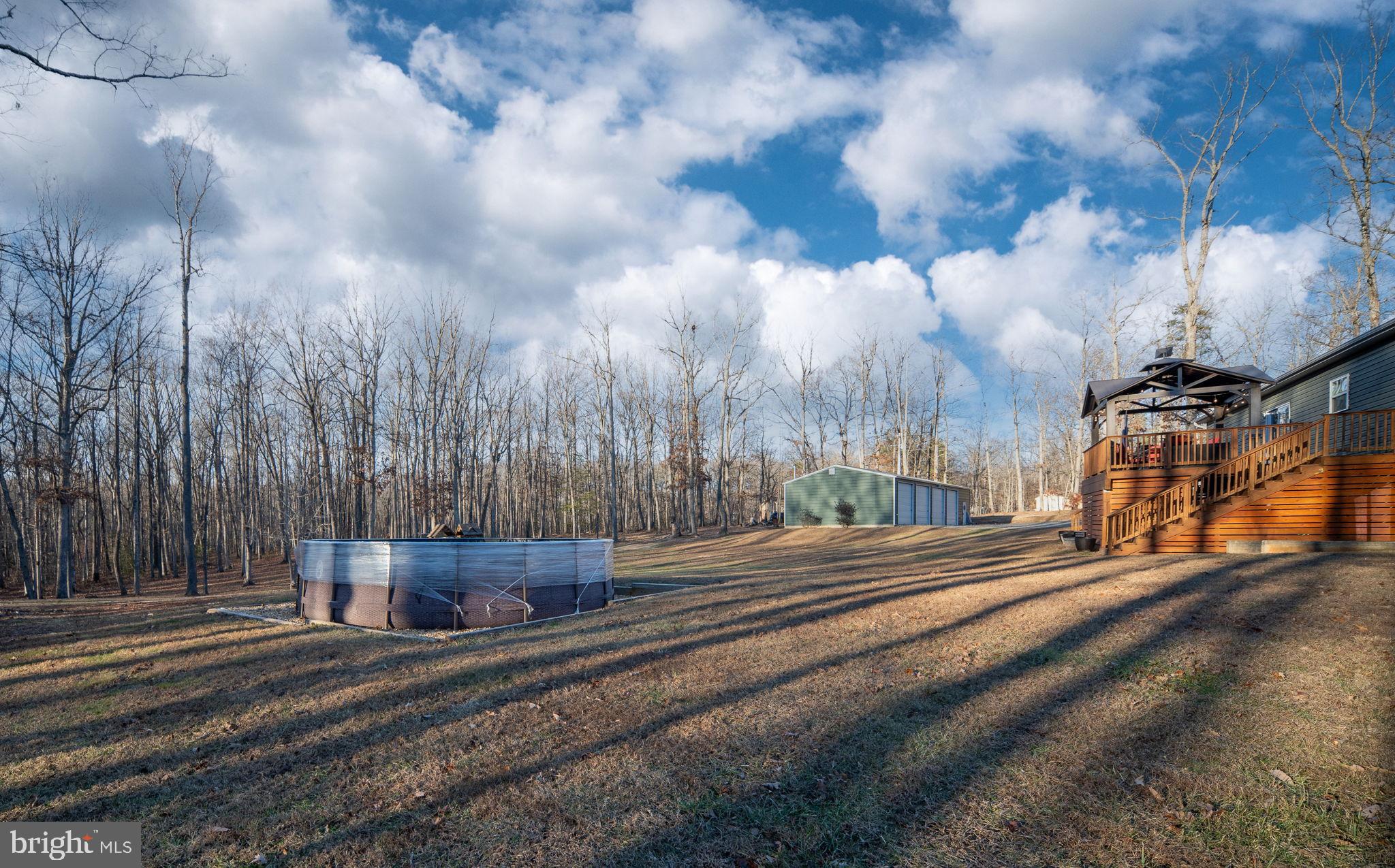 13026 Elk Run Road Bealeton, VA 22712 - Photo 47 of 55 Serene woodland retreat with open space.