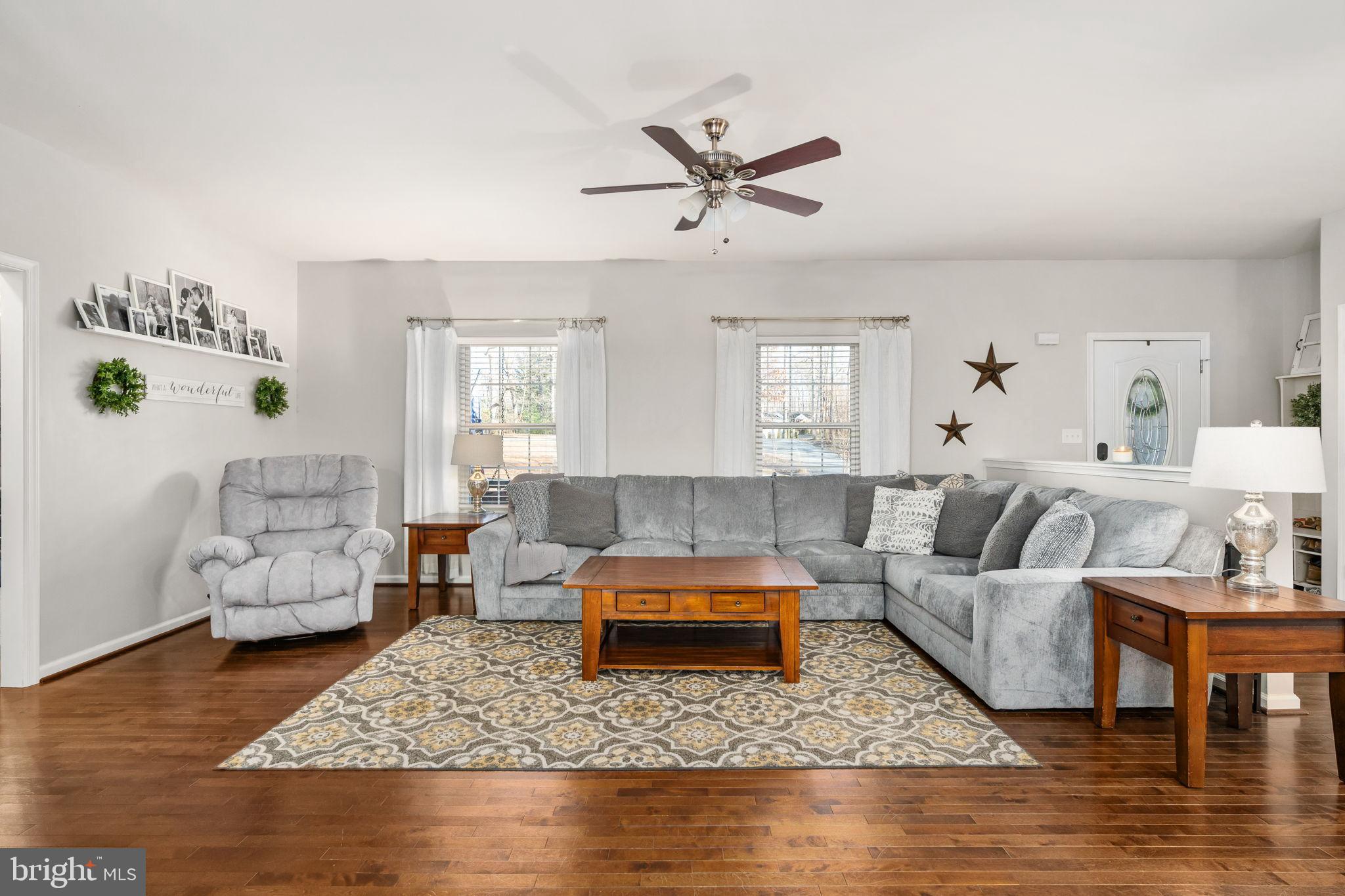 13026 Elk Run Road Bealeton, VA 22712 - Photo 10 of 55 Inviting living space with warm wooden floors.