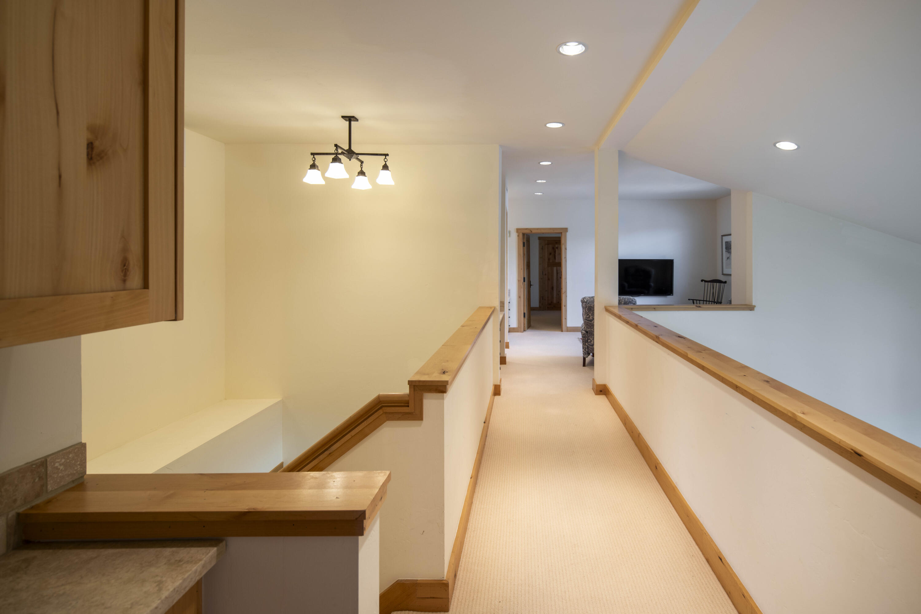 109 Angani Way, Unit 15 Sun Valley, ID 83353 - Photo 17 of 43 Second Level Walkway with Cabinetry