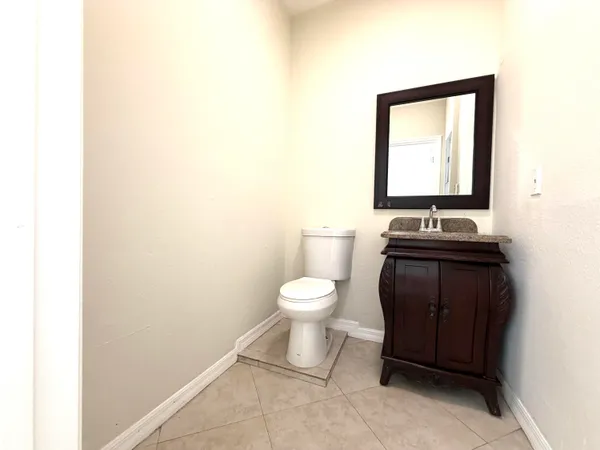 a sign broad on the side of the road