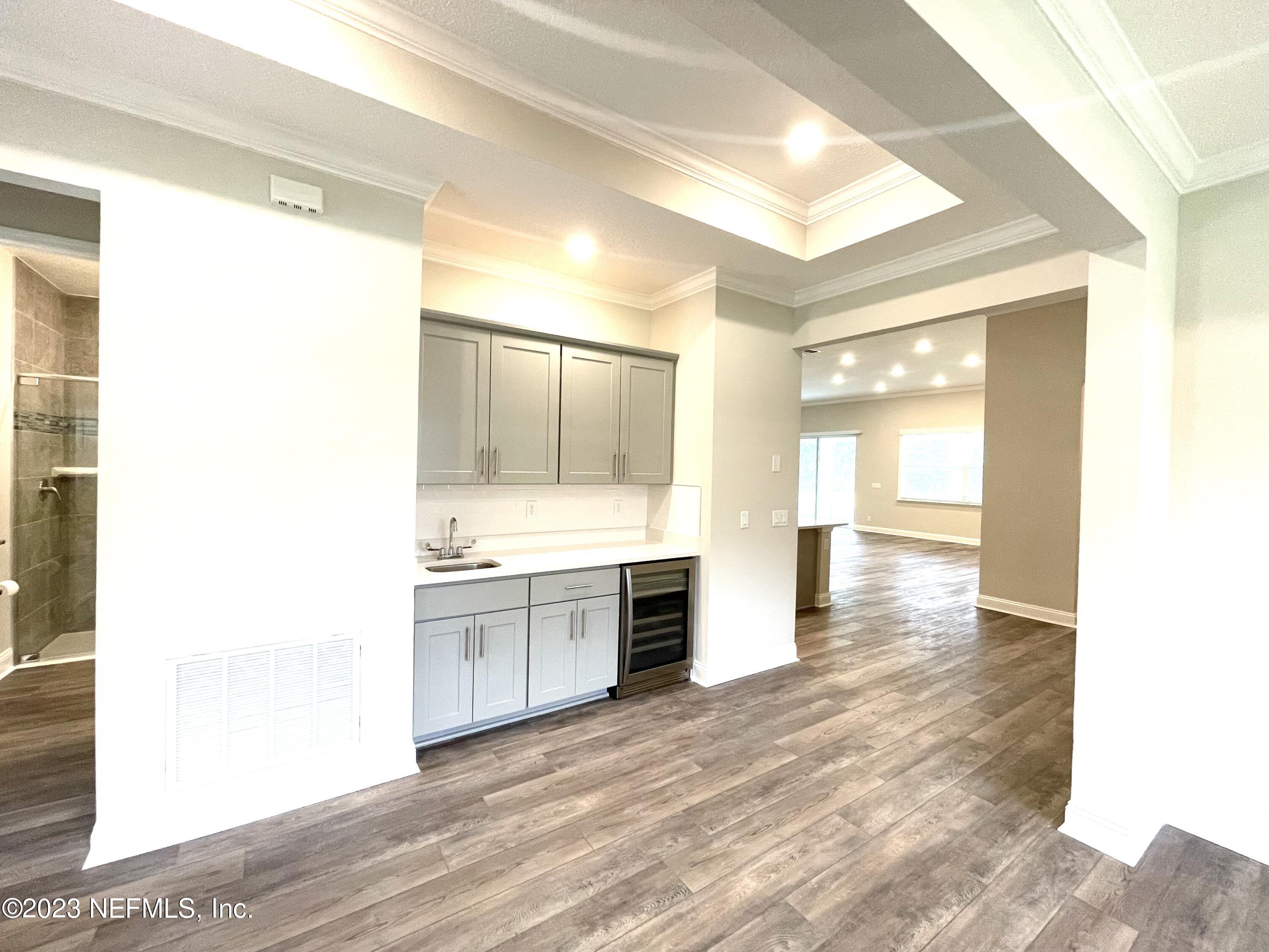 1521 Lake Foxmeadow Road Middleburg, FL 32068 - Photo 13 of 25 a large bathroom with a sink and a mirror