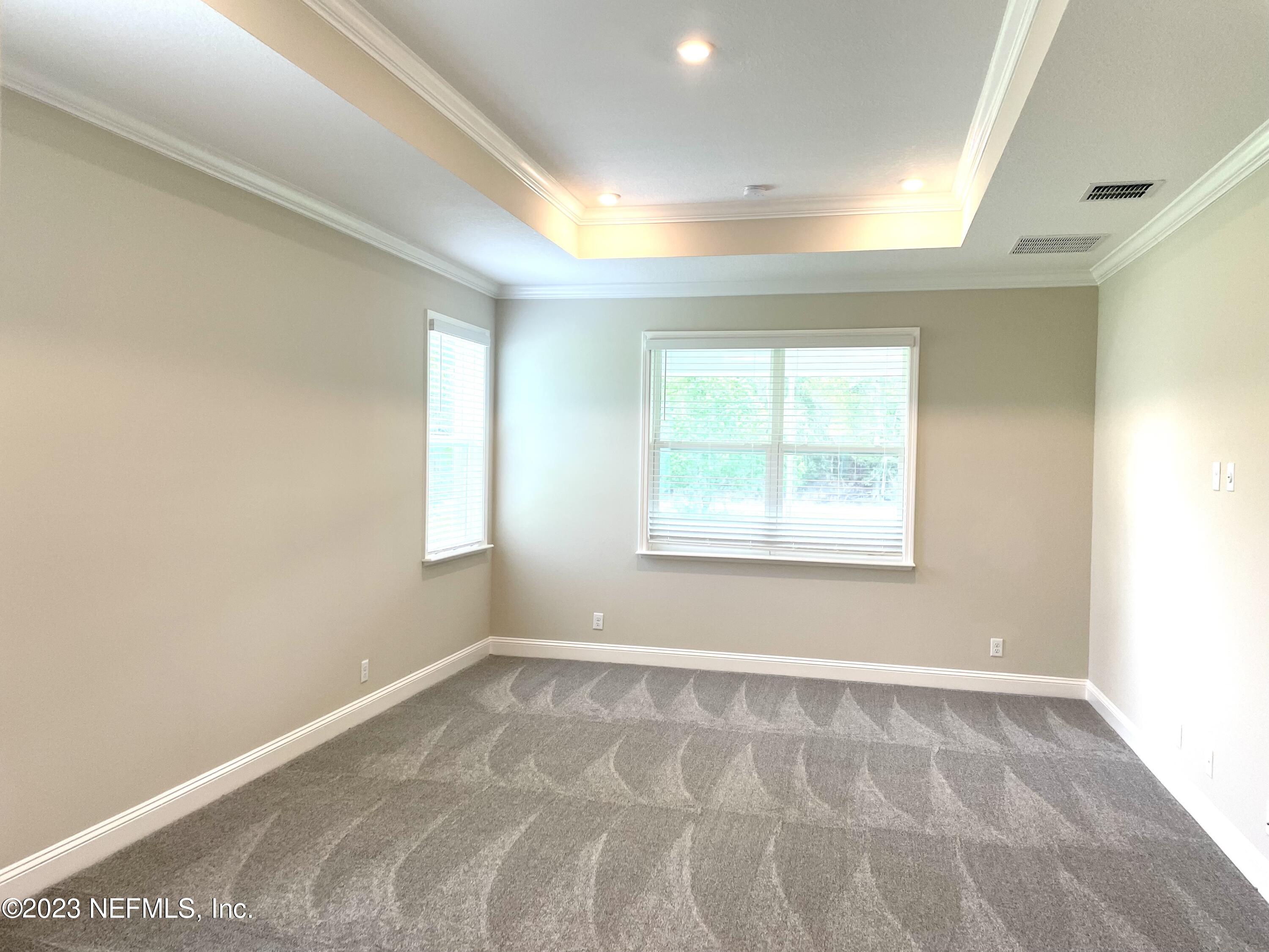 1521 Lake Foxmeadow Road Middleburg, FL 32068 - Photo 15 of 25 a view of an empty room with a window