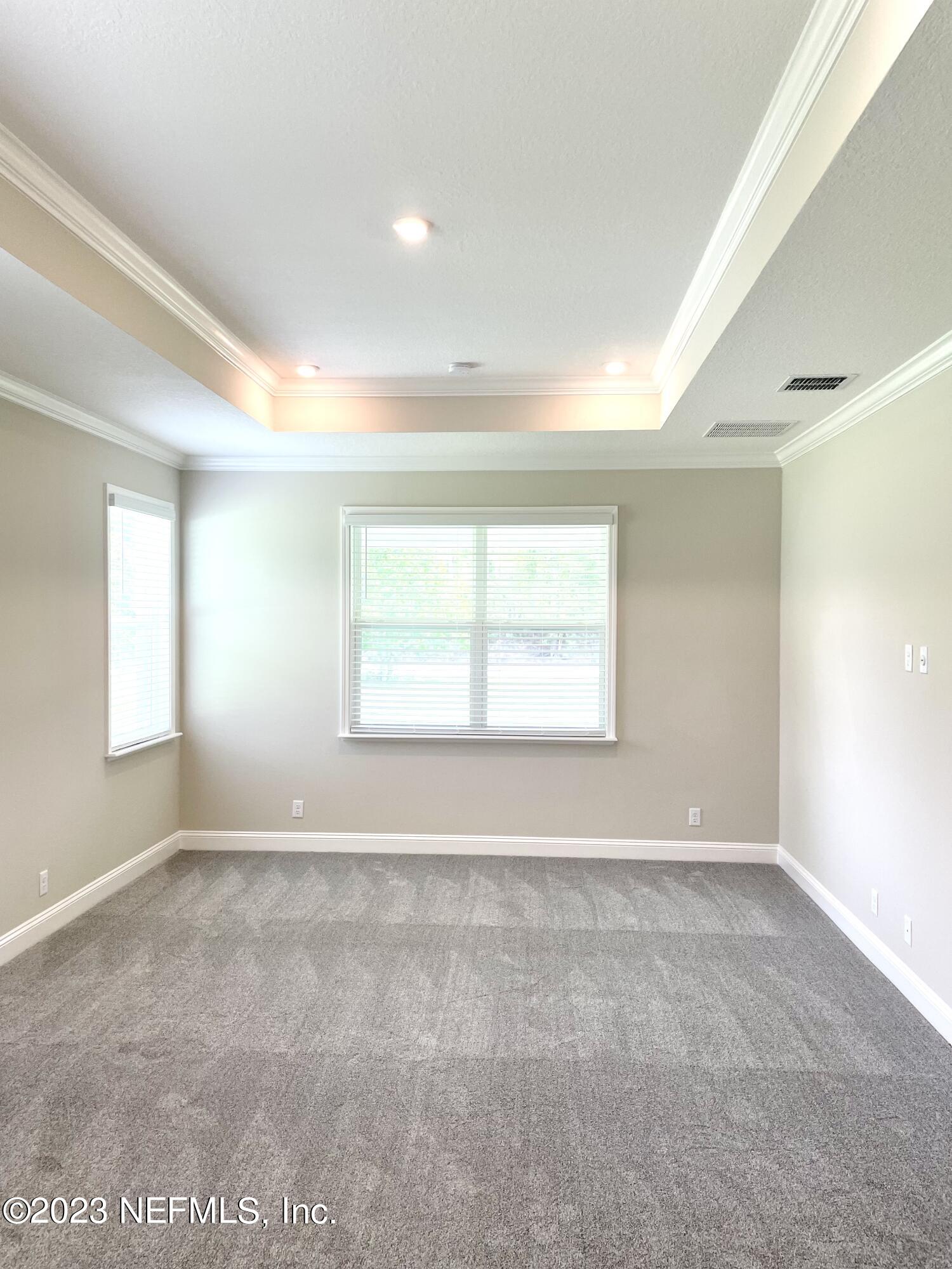 1521 Lake Foxmeadow Road Middleburg, FL 32068 - Photo 25 of 25 an empty room with windows