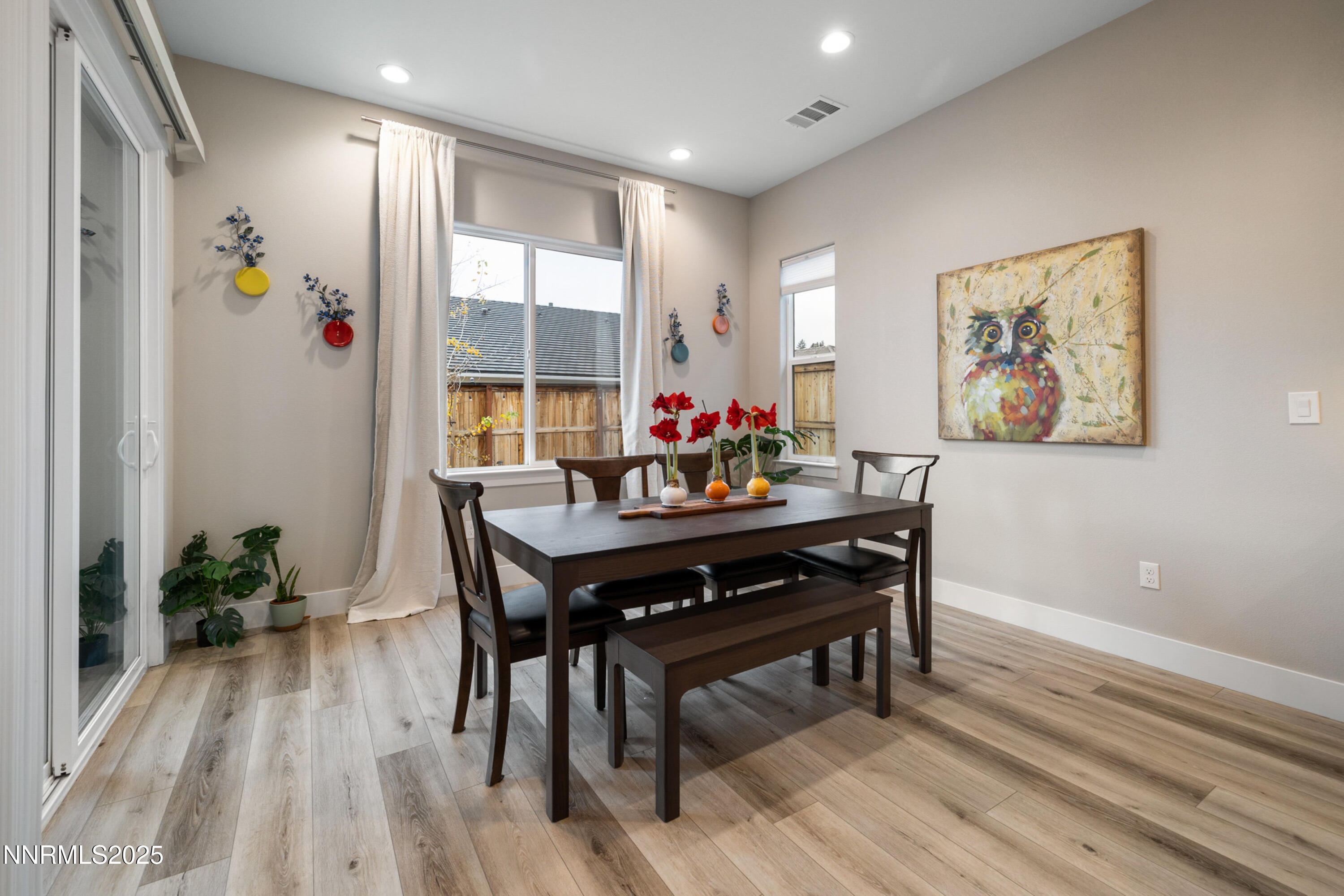 250 Commodore Drive Verdi, NV 89439 - Photo 12 of 43 a view of a dining room with furniture window and wooden floor
