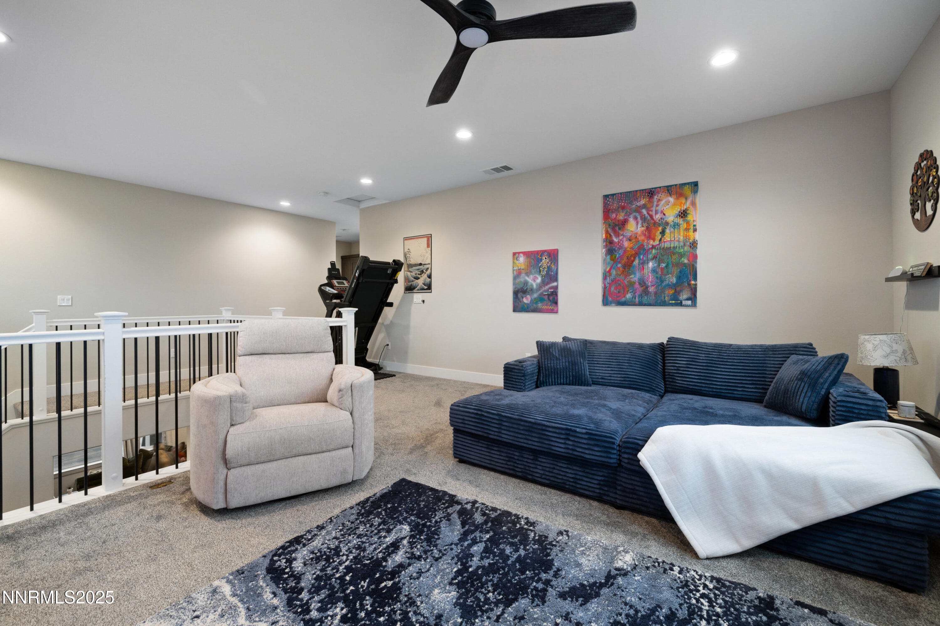 250 Commodore Drive Verdi, NV 89439 - Photo 27 of 43 a living room with furniture and a painting