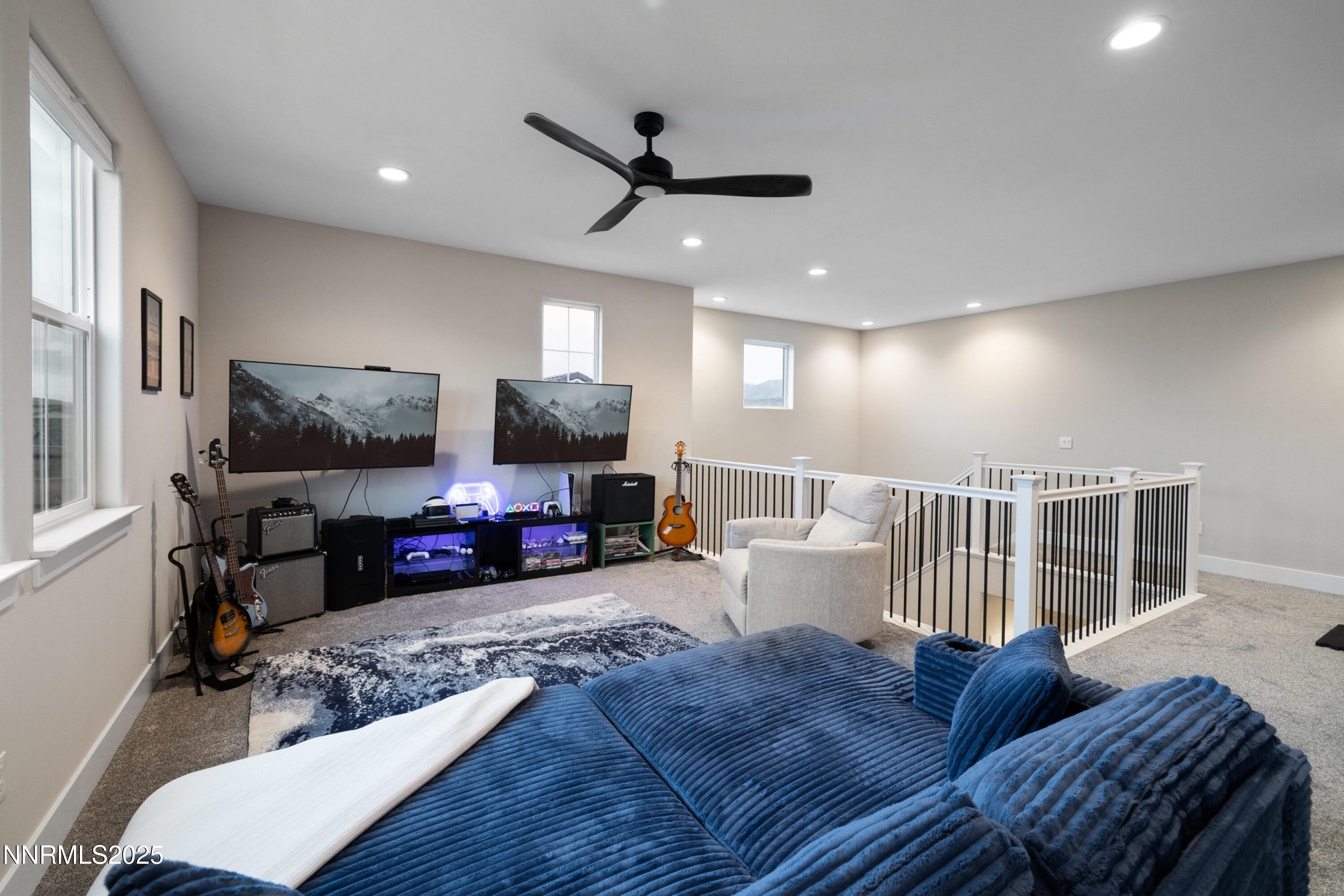 250 Commodore Drive Verdi, NV 89439 - Photo 28 of 43 a living room with furniture and a flat screen tv
