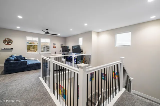 a view of kitchen with furniture and windows