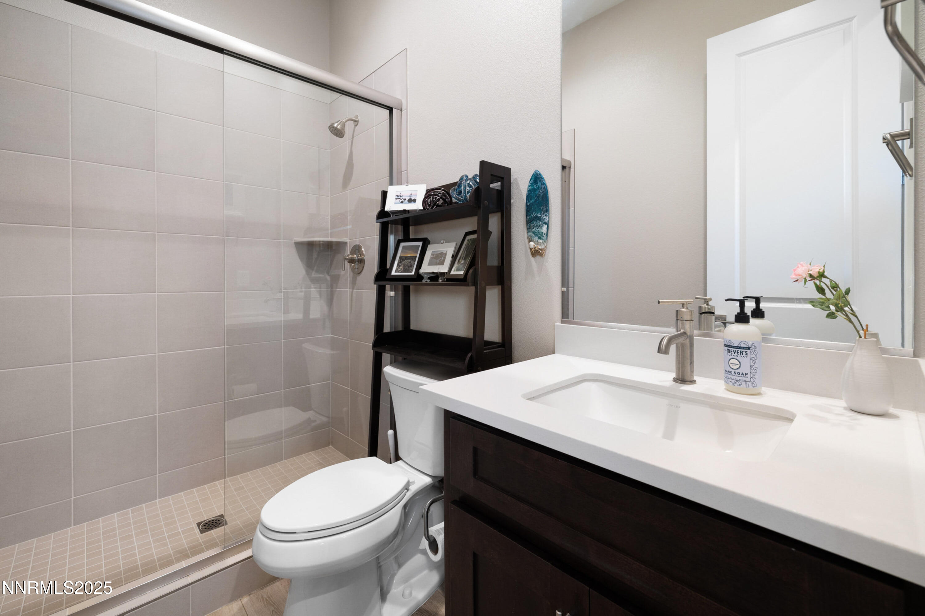 250 Commodore Drive Verdi, NV 89439 - Photo 32 of 43 a bathroom with a sink toilet vanity and shower