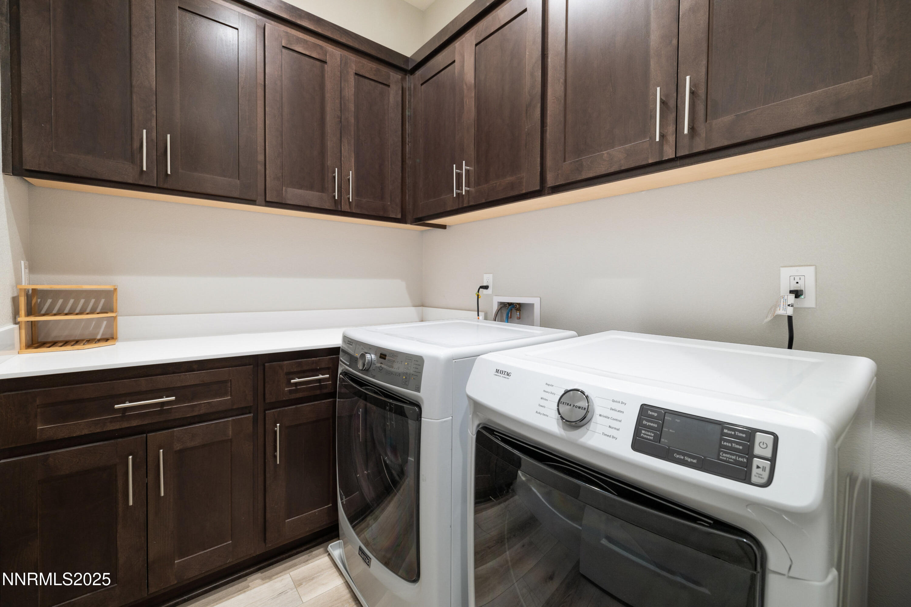 250 Commodore Drive Verdi, NV 89439 - Photo 34 of 43 a utility room with dryer and cabinets