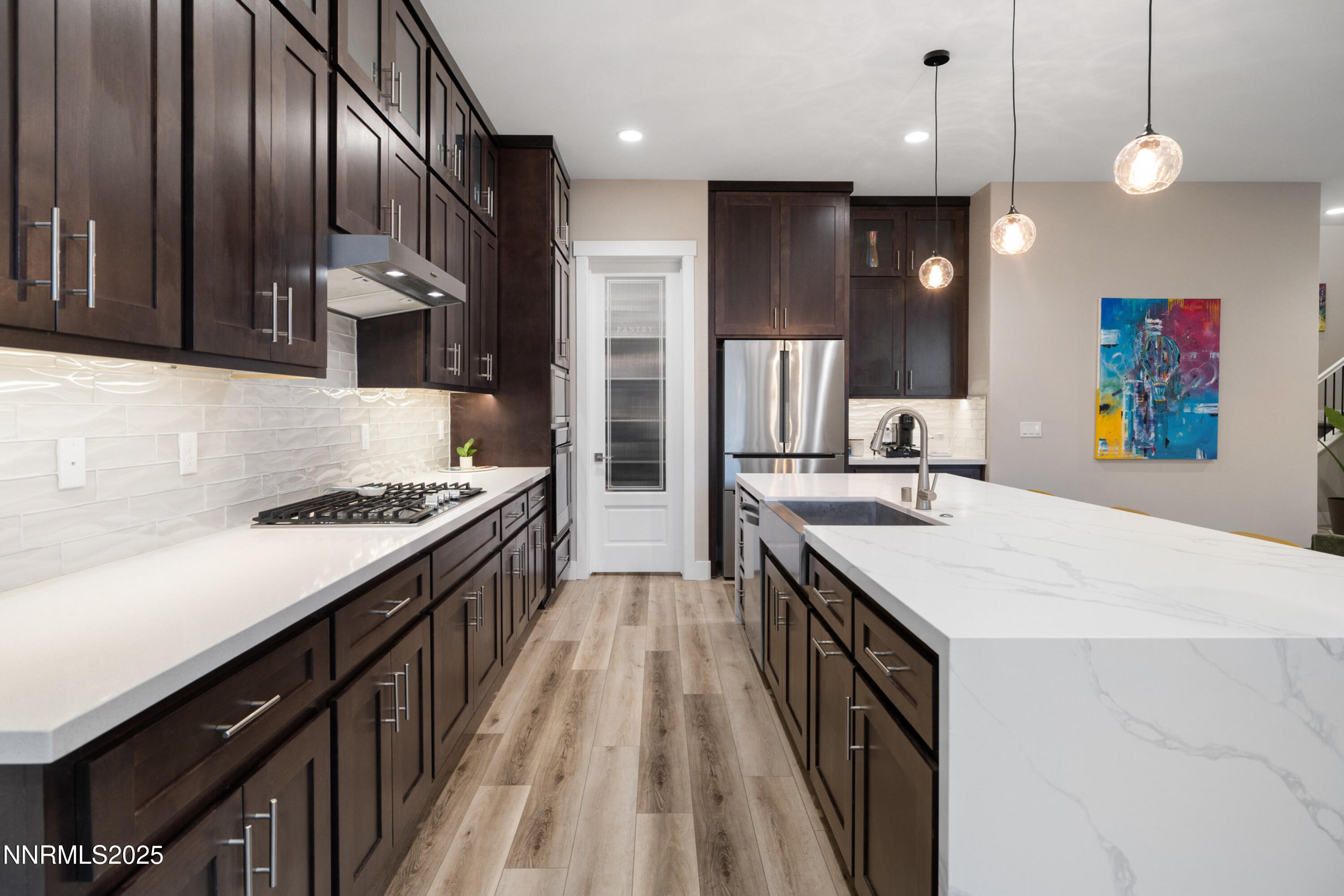 250 Commodore Drive Verdi, NV 89439 - Photo 8 of 43 a kitchen with a stove and a sink