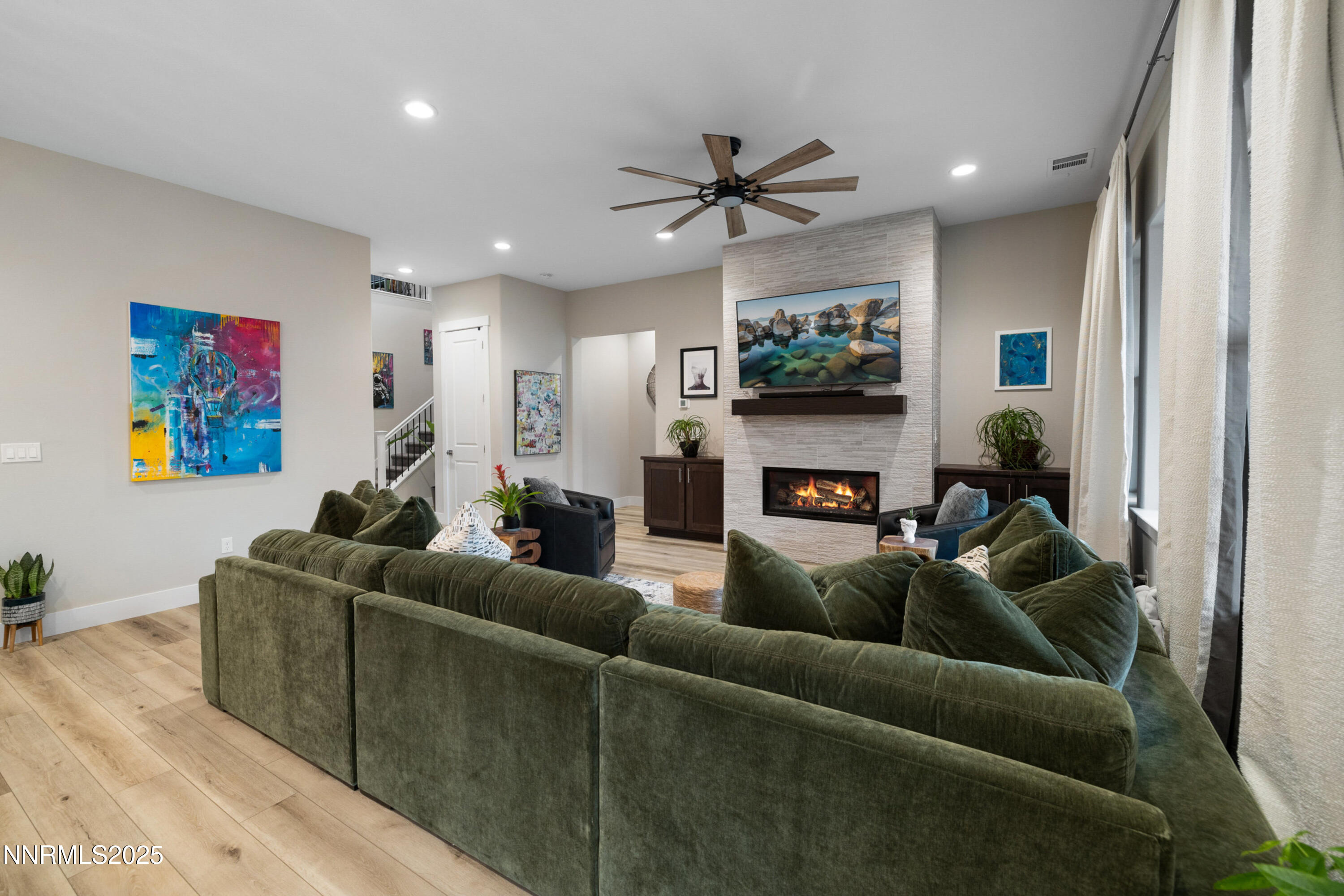 250 Commodore Drive Verdi, NV 89439 - Photo 9 of 43 a living room with fireplace furniture and a flat screen tv