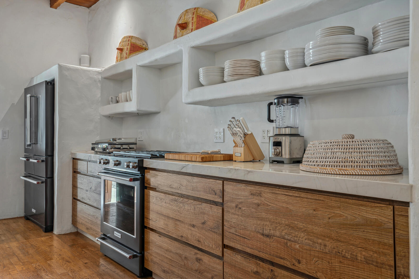 71607 Sahara Road Rancho Mirage, CA 92270 - Photo 22 of 63 a kitchen with stainless steel appliances granite countertop a sink and a stove
