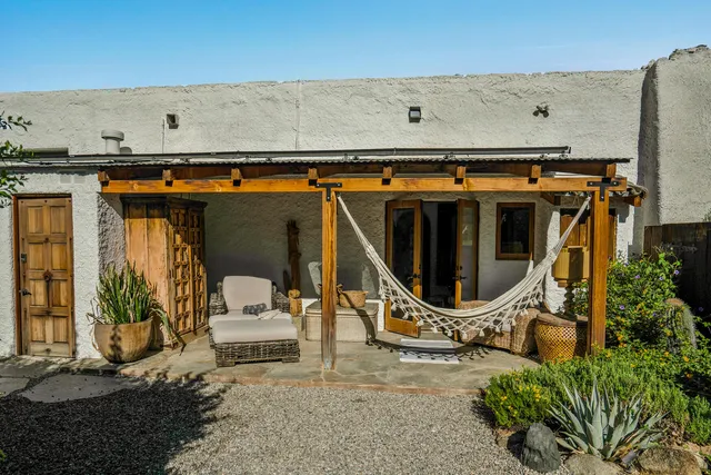 a bathroom with a sink a mirror and a shower