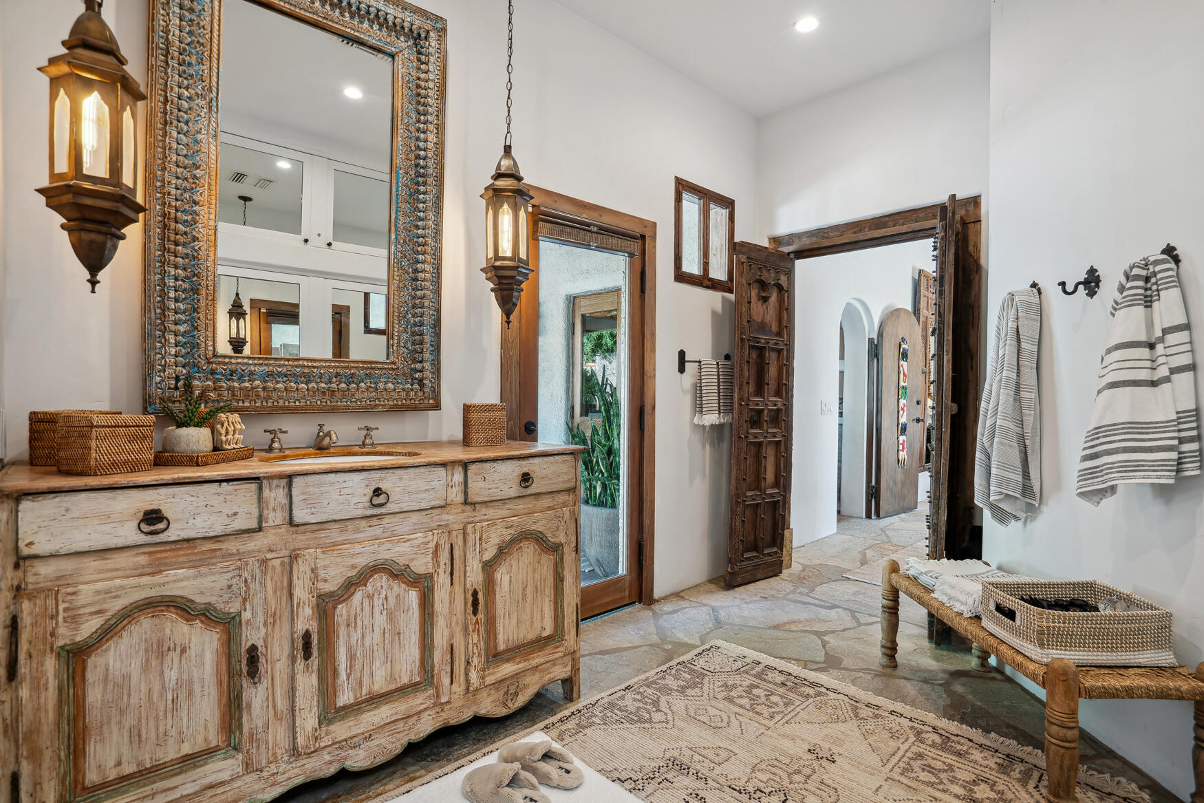 71607 Sahara Road Rancho Mirage, CA 92270 - Photo 34 of 63 a bathroom with a sink a mirror and a shower