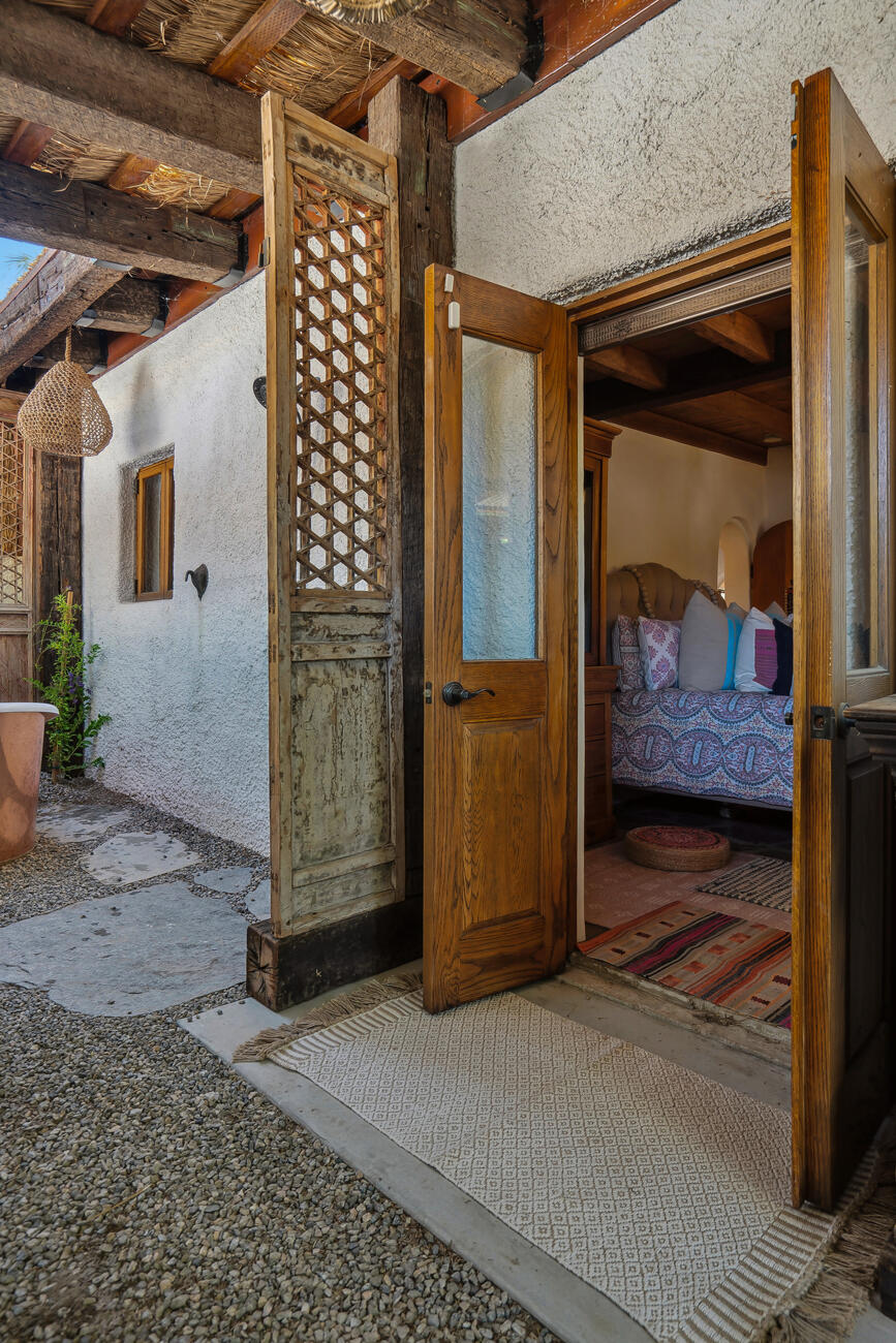 71607 Sahara Road Rancho Mirage, CA 92270 - Photo 48 of 63 a bedroom with a chair and the door