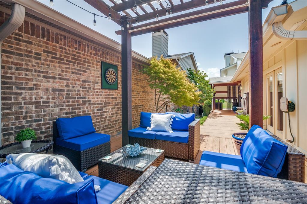 5901 Ranger Drive Rockwall, TX 75032 - Photo 21 of 26 Enjoy morning or evenings under the pergola on your private deck