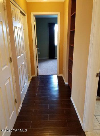 1920 South Euclid Road Grandview, WA 98930 - Photo 7 of 20 a view of a hallway with wooden floor