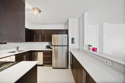 a kitchen with a stove and a microwave