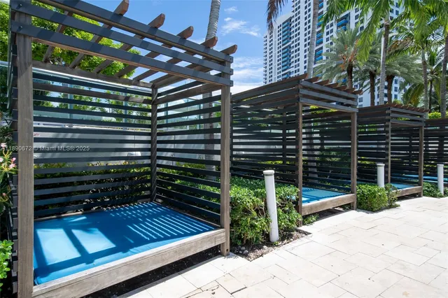 a view of a swimming pool with a patio