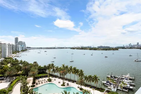 a view of balcony with furniture