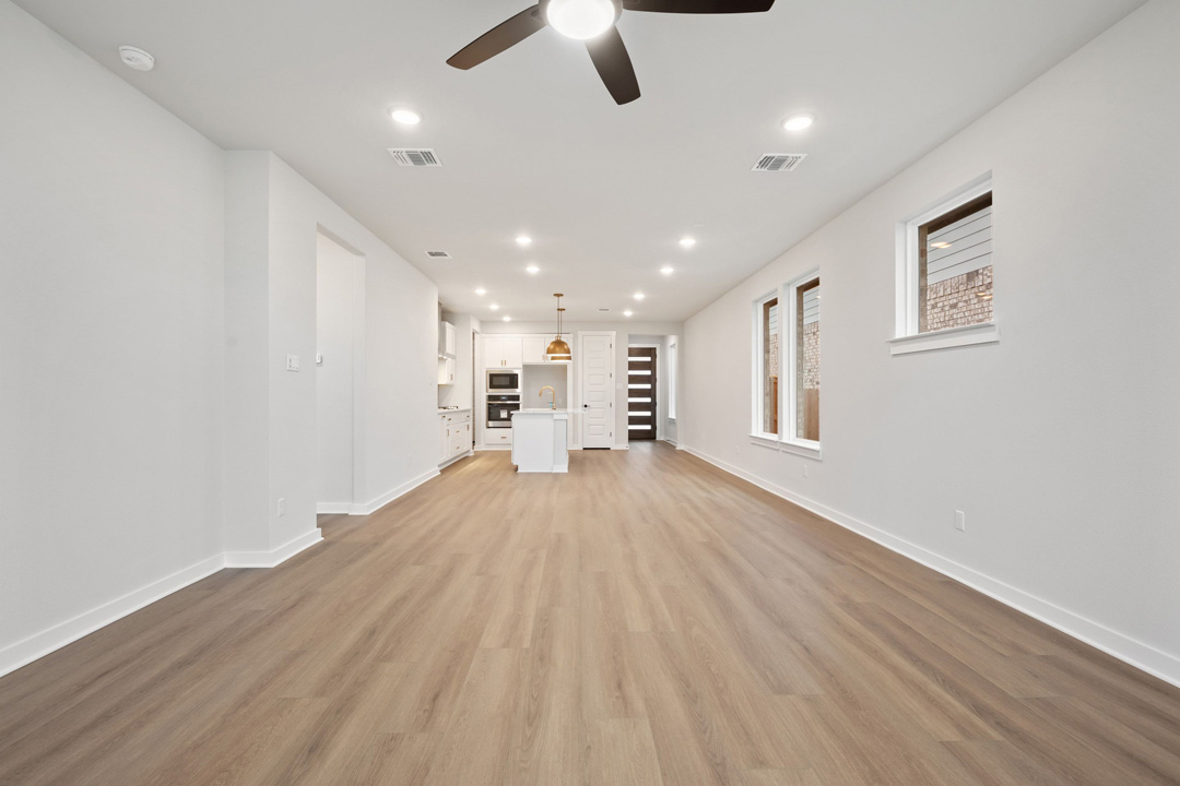 204 Bloomington Loop Hutto, TX 78634 - Photo 12 of 37 a view of empty room with wooden floor