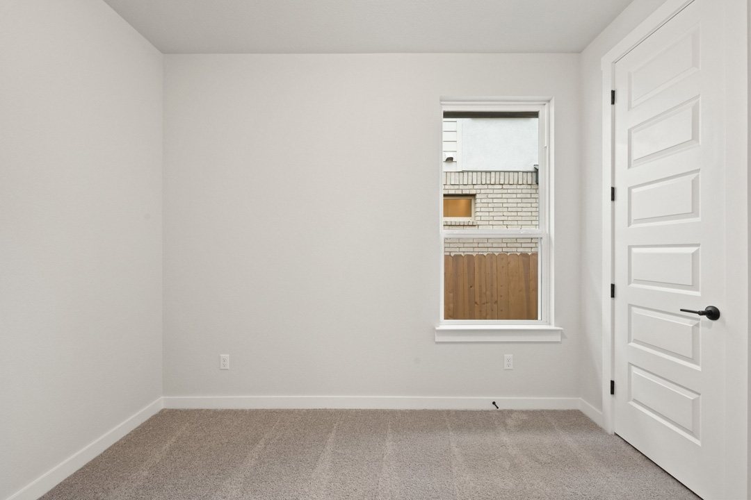 204 Bloomington Loop Hutto, TX 78634 - Photo 29 of 37 an empty room with a window