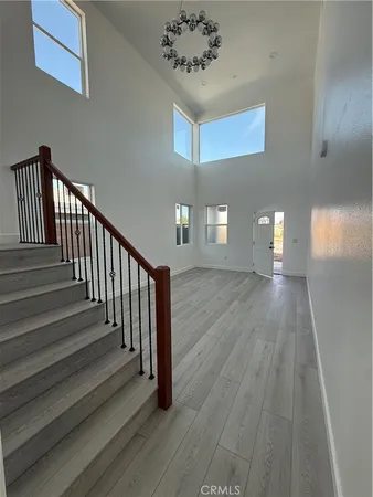 a view of entryway with wooden floor
