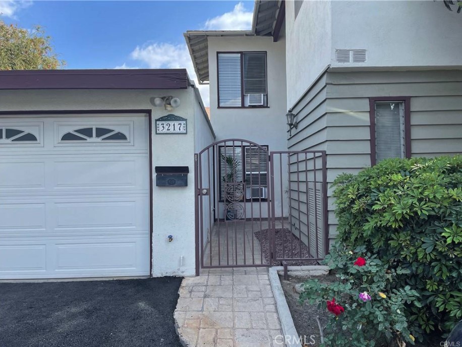 3217 Topaz Lane Fullerton, CA 92831 - Photo 3 of 23 a view of a entrance gate of the house