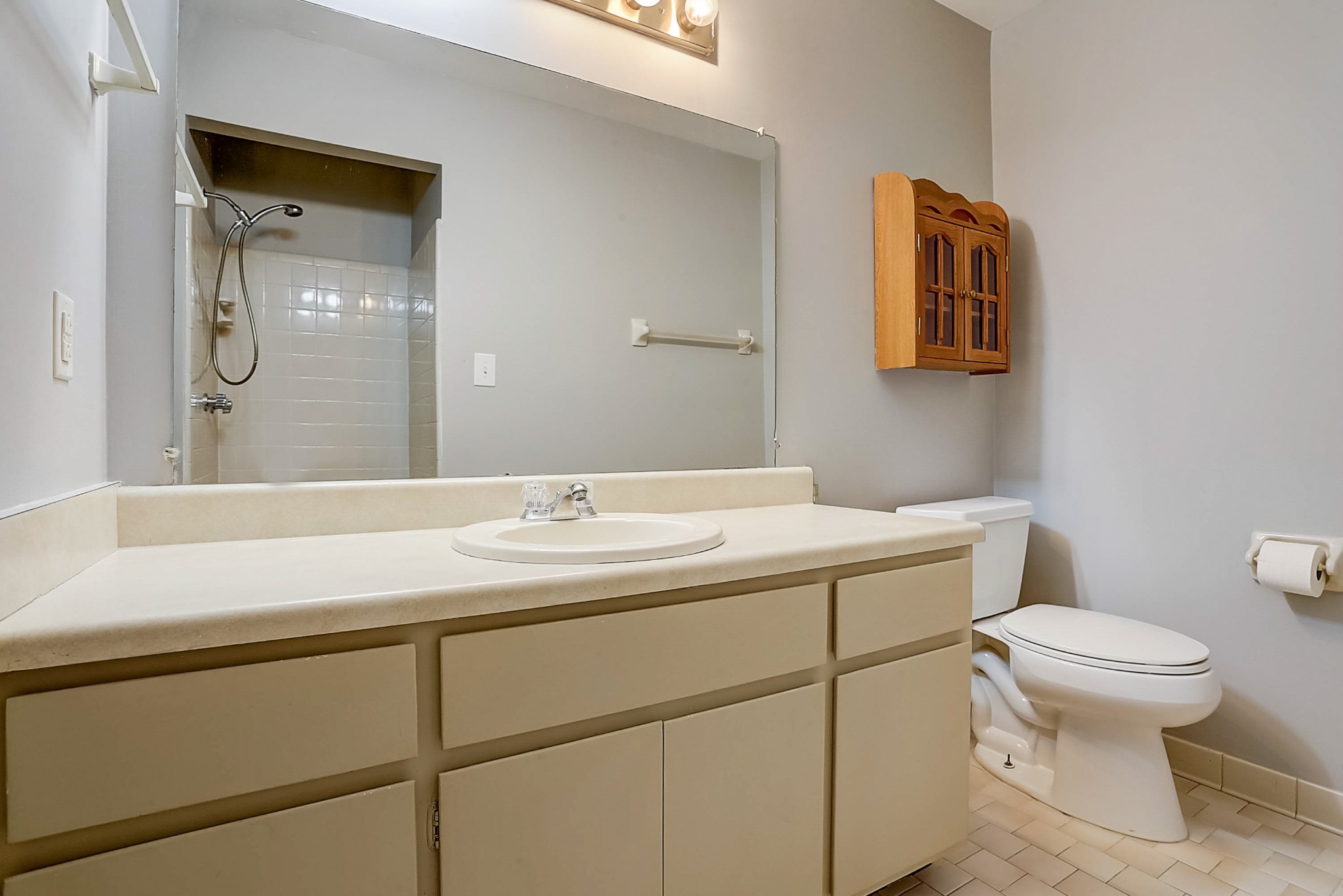741 Kent Road Nashville, TN 37214 - Photo 20 of 25 a bathroom with a sink a toilet and mirror
