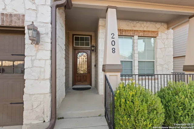 a view of a door and chair in the balcony