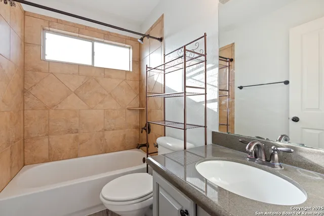 a bathroom with a sink toilet bathtub and shower