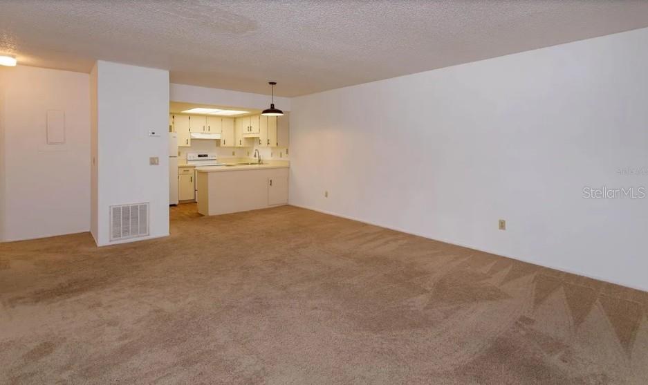 68 Windtree Lane, Unit 201 Winter Garden, FL 34787 - Photo 11 of 23 a view of a kitchen with a sink