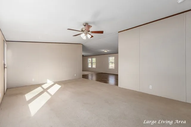 a view of empty room with windows