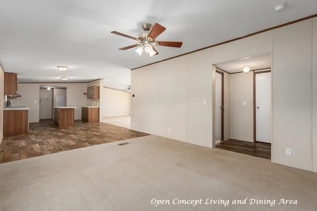 a view of livingroom with kitchen
