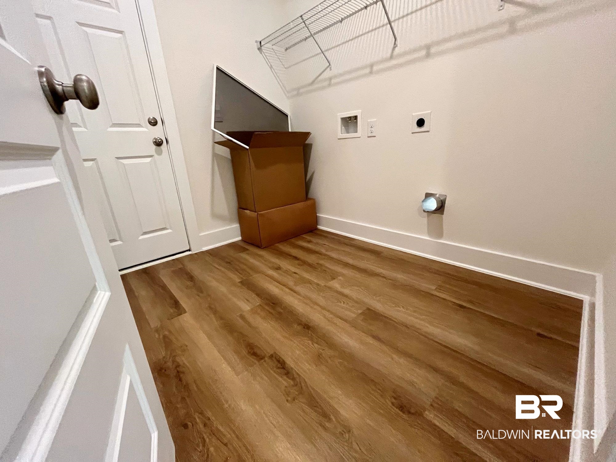 337 Barndling Street Fairhope, AL 36532 - Photo 12 of 34 Clothes washing area with hookup for a washing machine, wood-type flooring, and hookup for an electric dryer