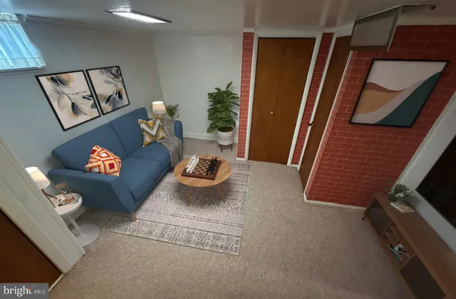 a view of a brick building next to a yard