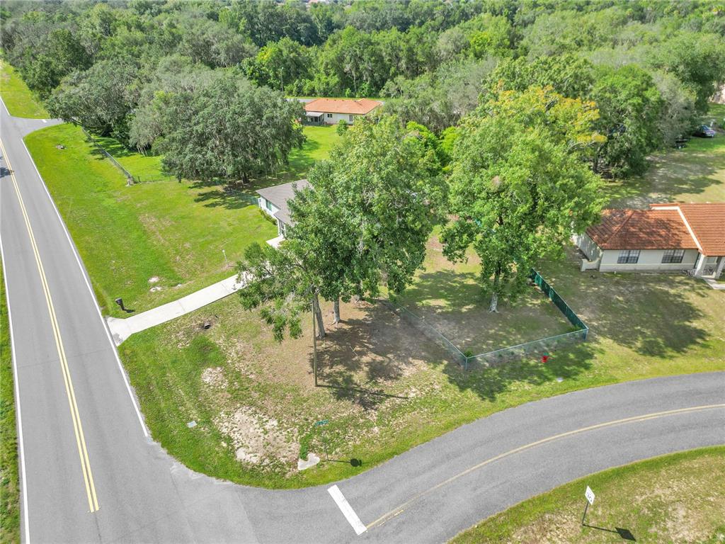 814 Oak Road Ocala, FL 34472 - Photo 13 of 52 a view of a garden with a tree