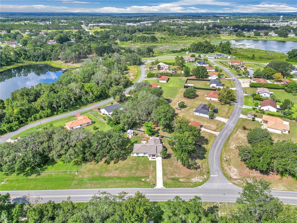 814 Oak Road Ocala, FL 34472 - Photo 4 of 52 a view of a garden with a lake
