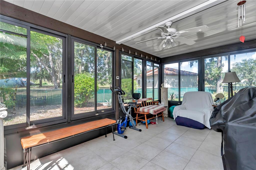 814 Oak Road Ocala, FL 34472 - Photo 47 of 52 a living room with furniture and a large window