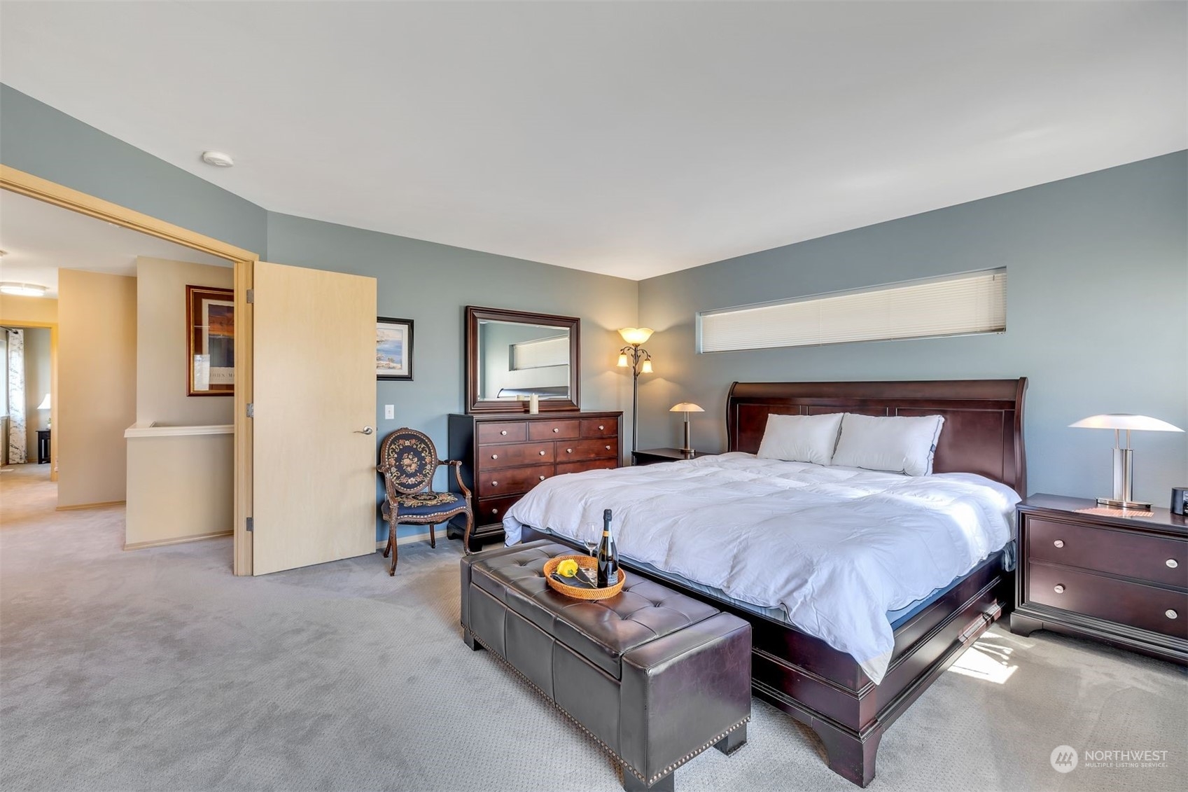 3807 Northeast 14th Street Renton, WA 98056 - Photo 16 of 34 a bedroom with a bed and a night stand