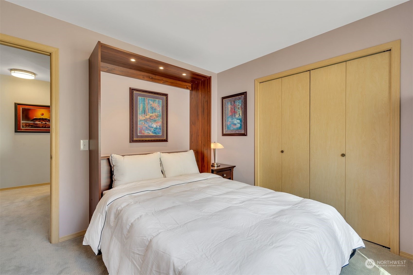 3807 Northeast 14th Street Renton, WA 98056 - Photo 18 of 34 a bedroom with a large bed and a window