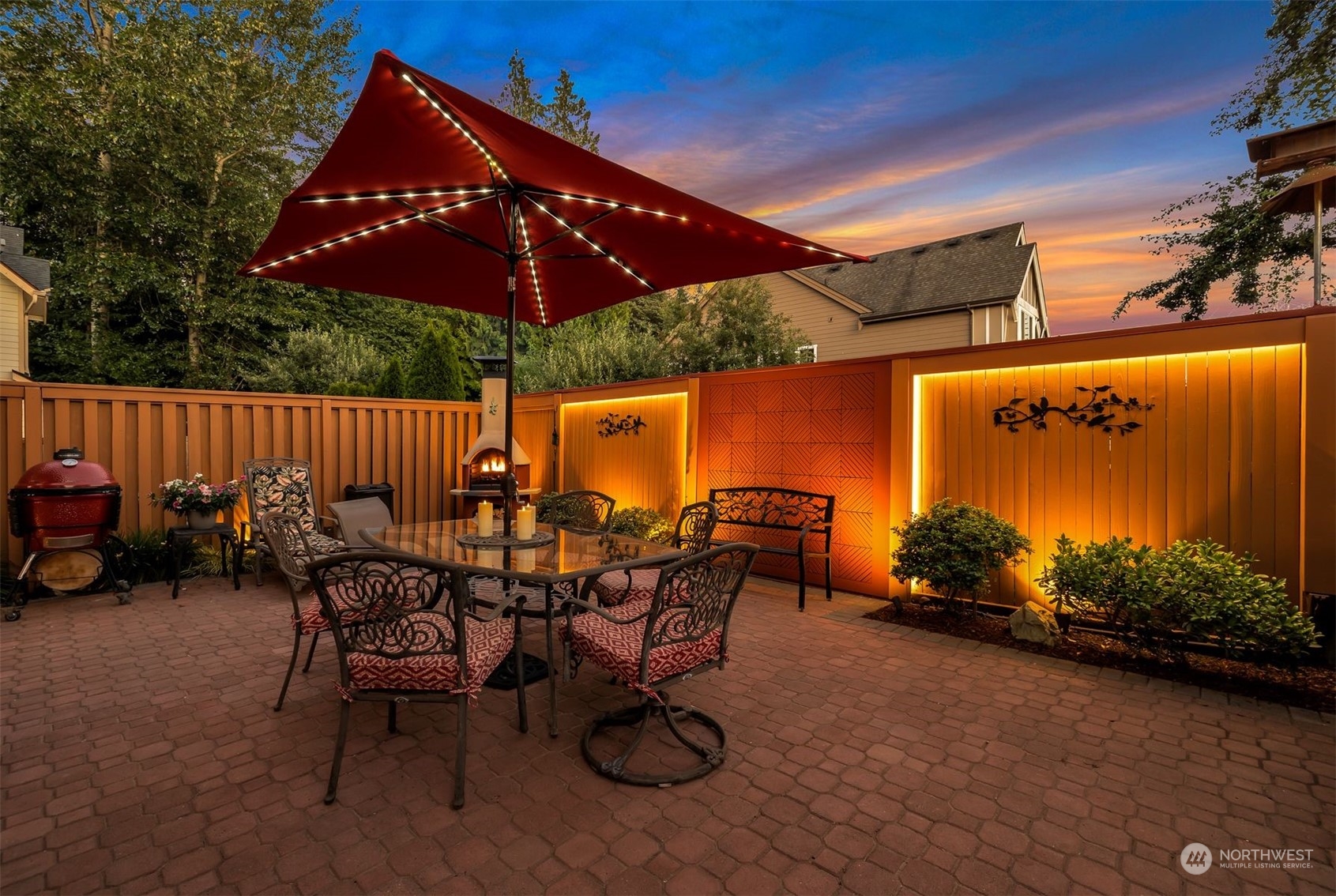 3807 Northeast 14th Street Renton, WA 98056 - Photo 19 of 34 a patio with table and chairs
