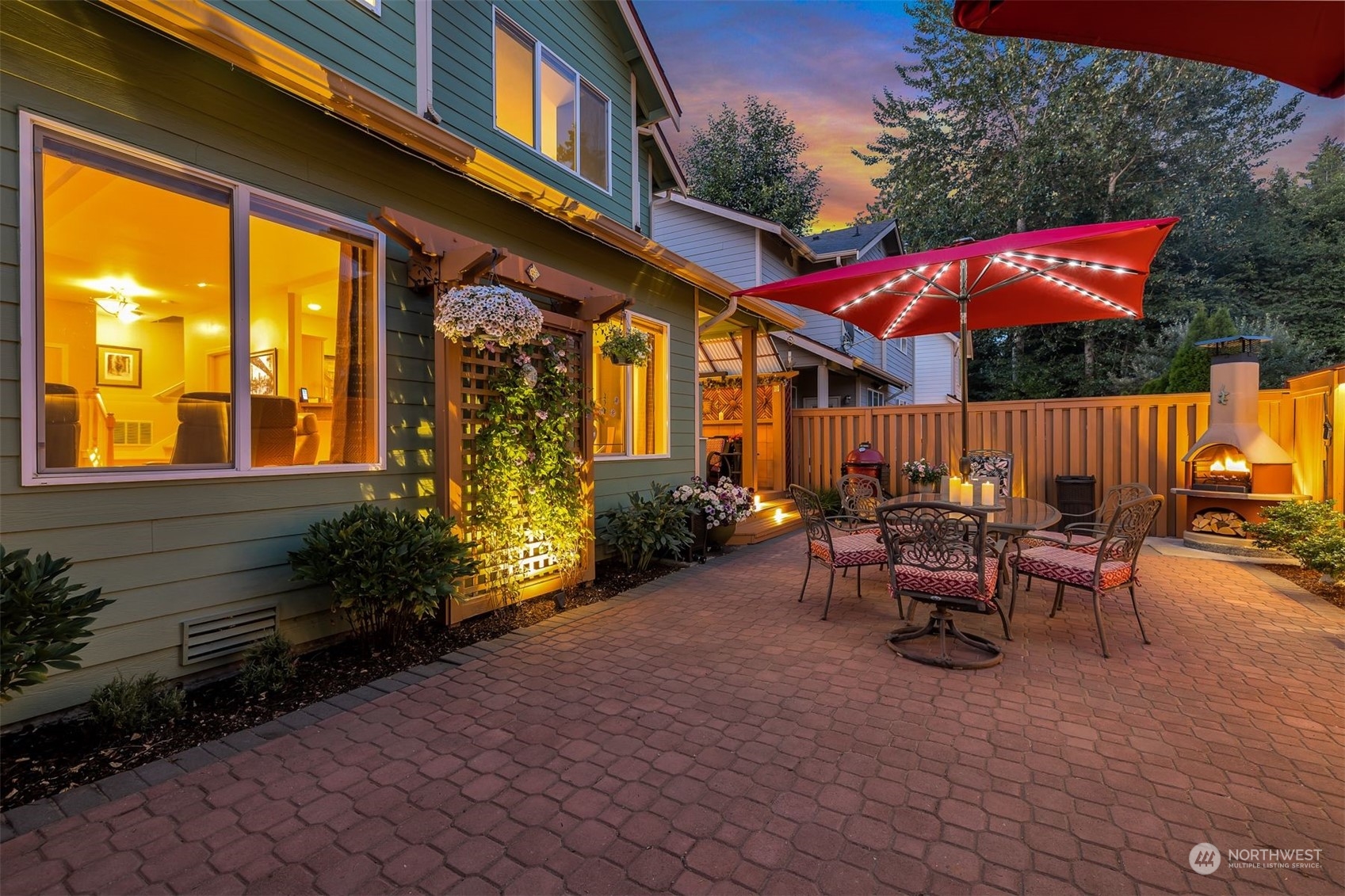 3807 Northeast 14th Street Renton, WA 98056 - Photo 27 of 34 a view of a house with backyard and sitting area