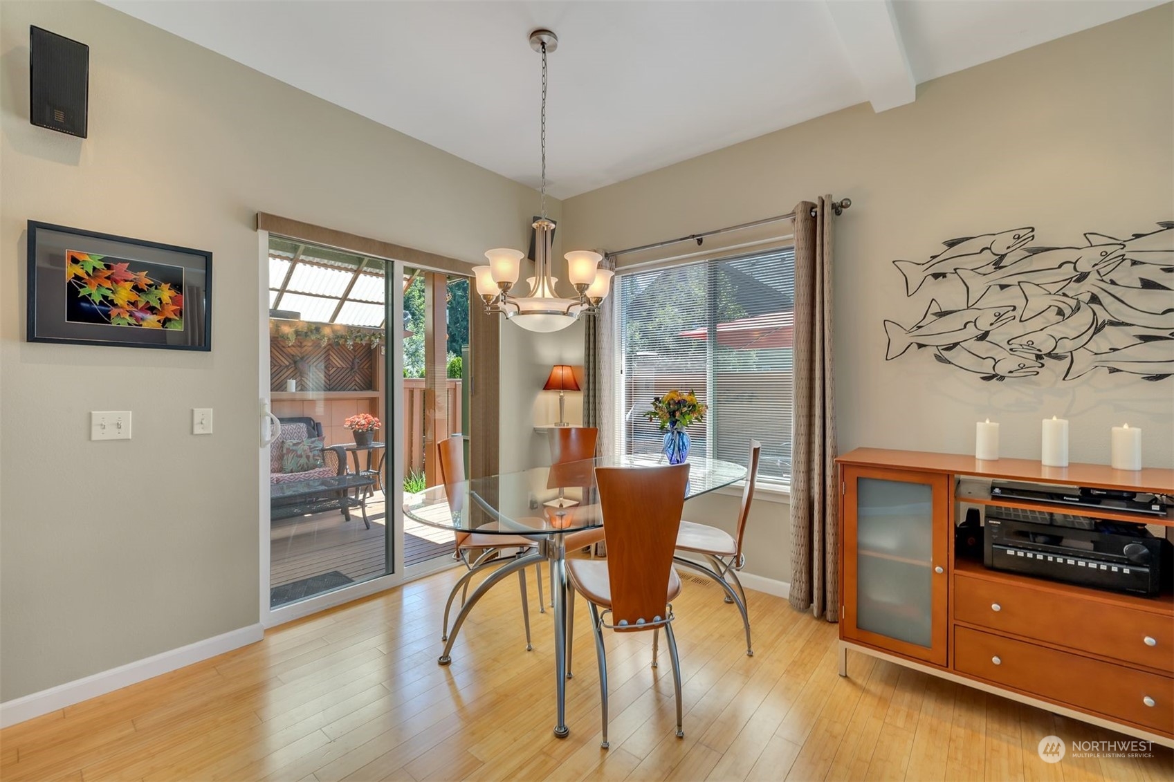 3807 Northeast 14th Street Renton, WA 98056 - Photo 5 of 34 a view of a dining room with furniture large window and wooden floor