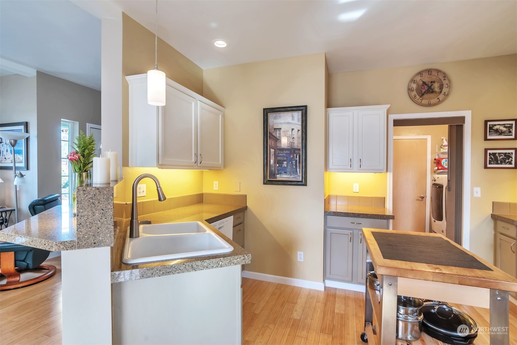 3807 Northeast 14th Street Renton, WA 98056 - Photo 8 of 34 a view of a kitchen with a sink and a refrigerator