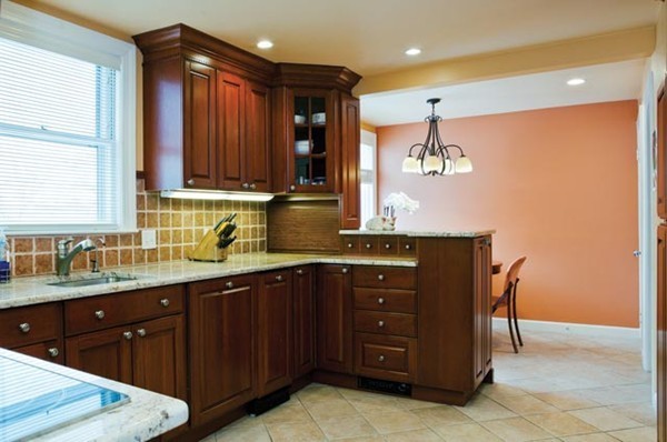 52 Oldham Road Newton, MA 02465 - Photo 7 of 11 a kitchen with a sink and wooden cabinets